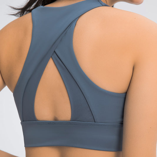 Cross shoulder sports bra