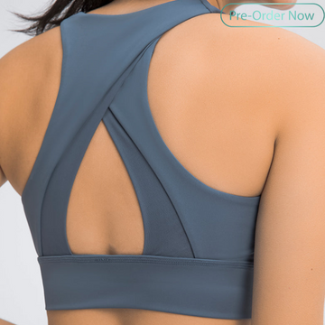 Cross shoulder sports bra