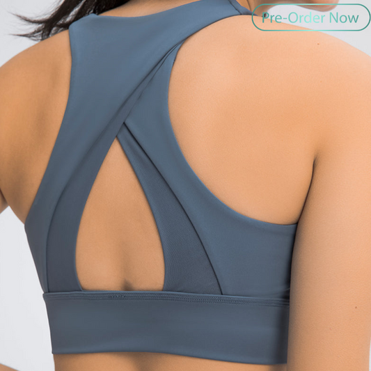 Cross shoulder sports bra