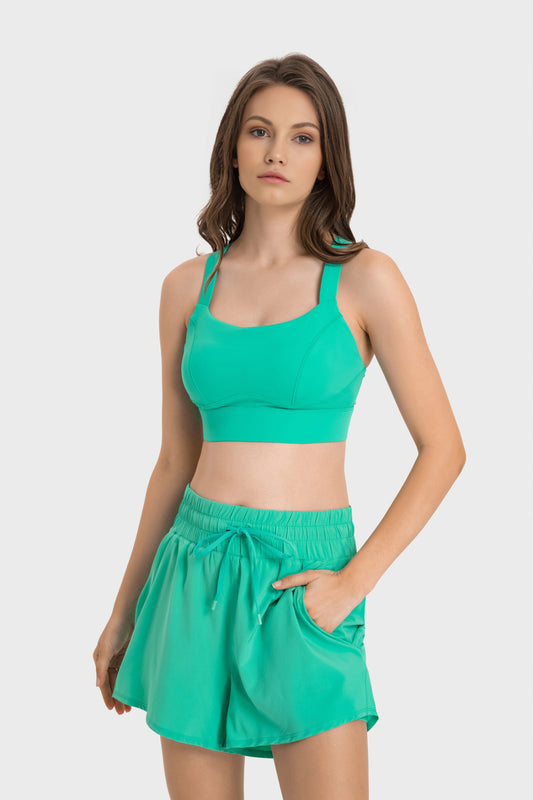 Cross-button sport bra
